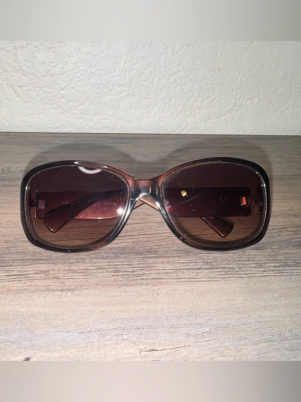 Coach Women’s Brown Sunglasses with Yellow Logo Accent